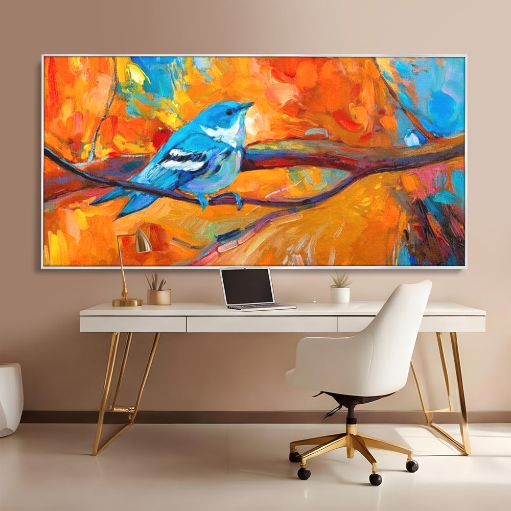Tablou canvas cu tablou canvas cu pasare albastra pe ramura, in rama de aluminiu argintiu, pe perete intr-un birou